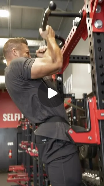 Tim Tebow training with weighted pull-ups