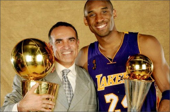 Tim Grover holding NBA Finals trophies with Kobe Bryant