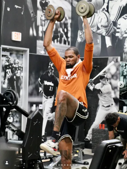 Kevin Durant performing overhead dumbbell press at Proactive