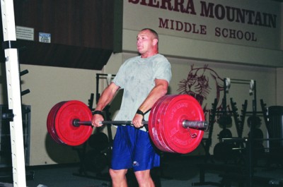Brian Urlacher performing a heavy clean in the weight room