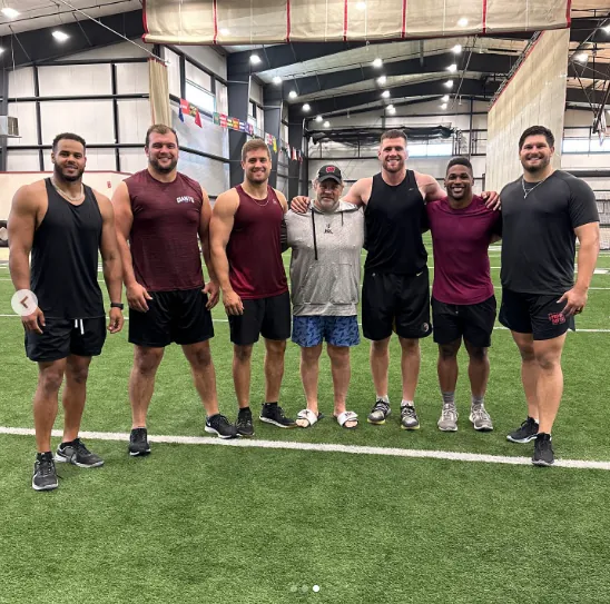 TJ and Derek Watt with training group at NX Level